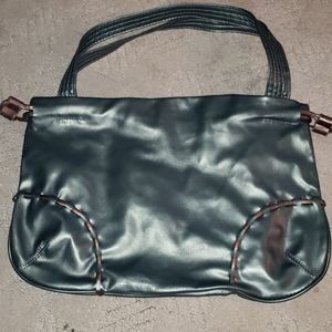 Magnetic snap handbag